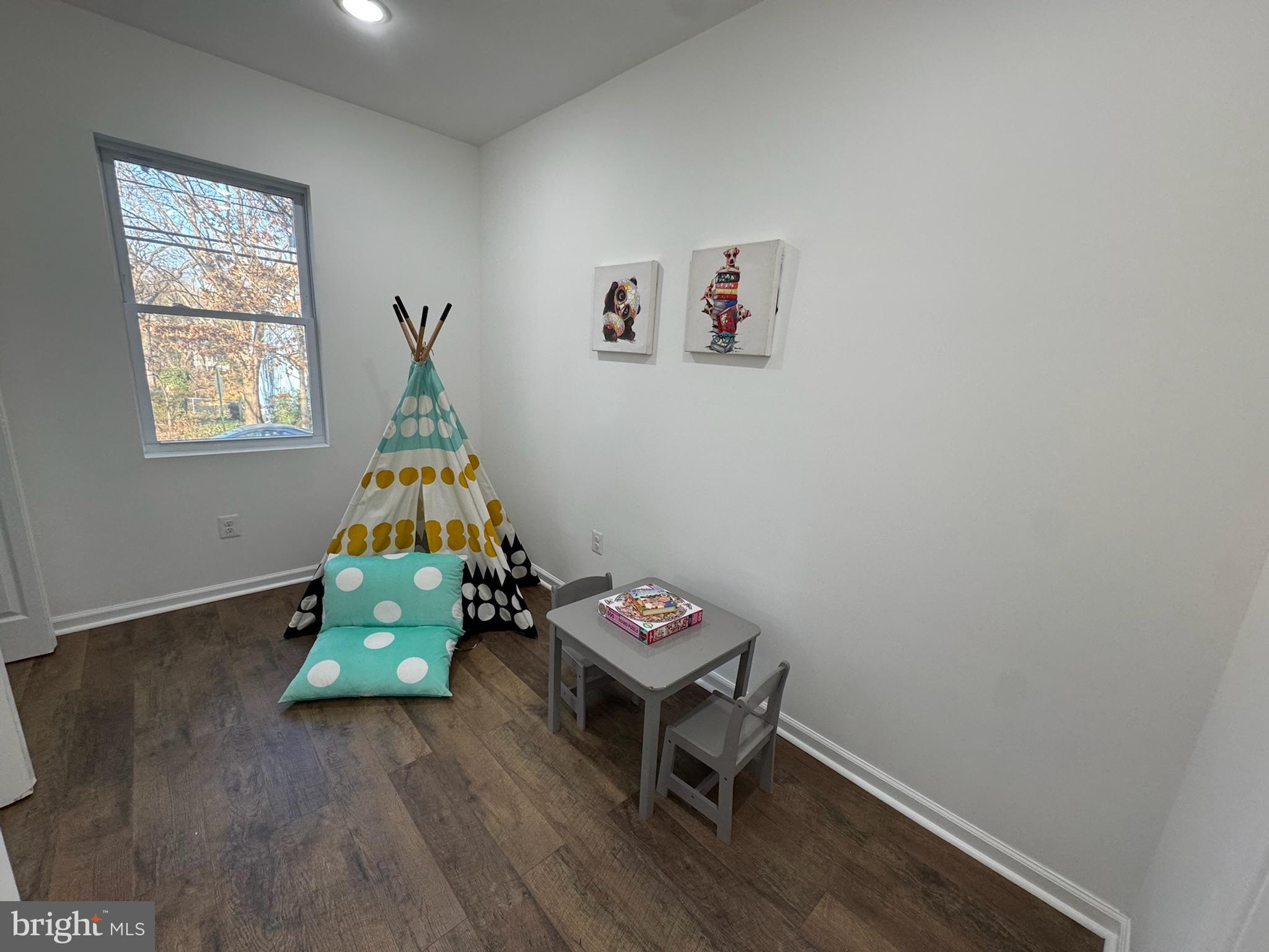 4116 32nd Street Mount Rainier, MD 20712 - Photo 29 of 51 a room with furniture and window