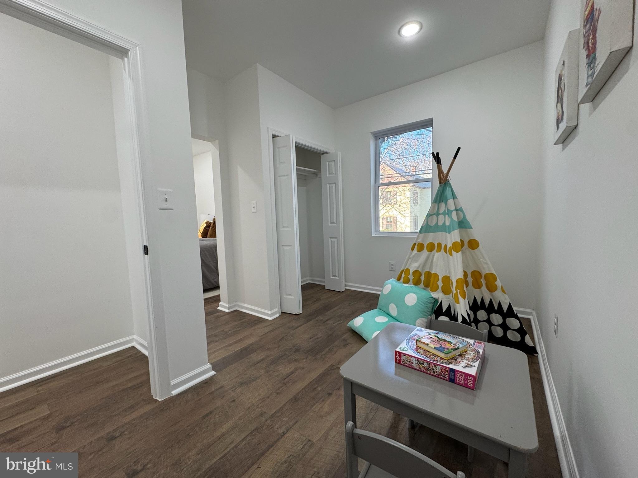 4116 32nd Street Mount Rainier, MD 20712 - Photo 30 of 51 a living room with furniture and a window