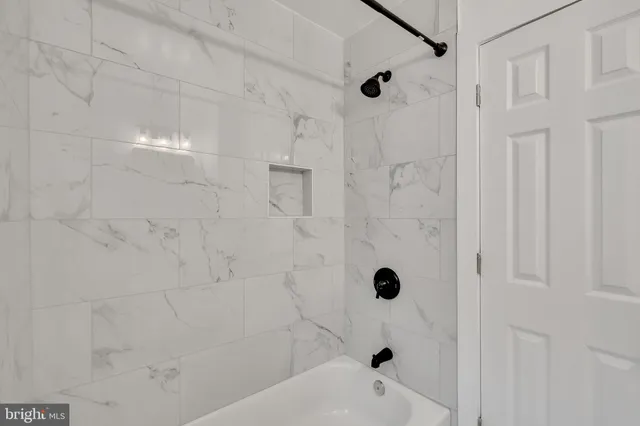 a bathroom with a bathtub