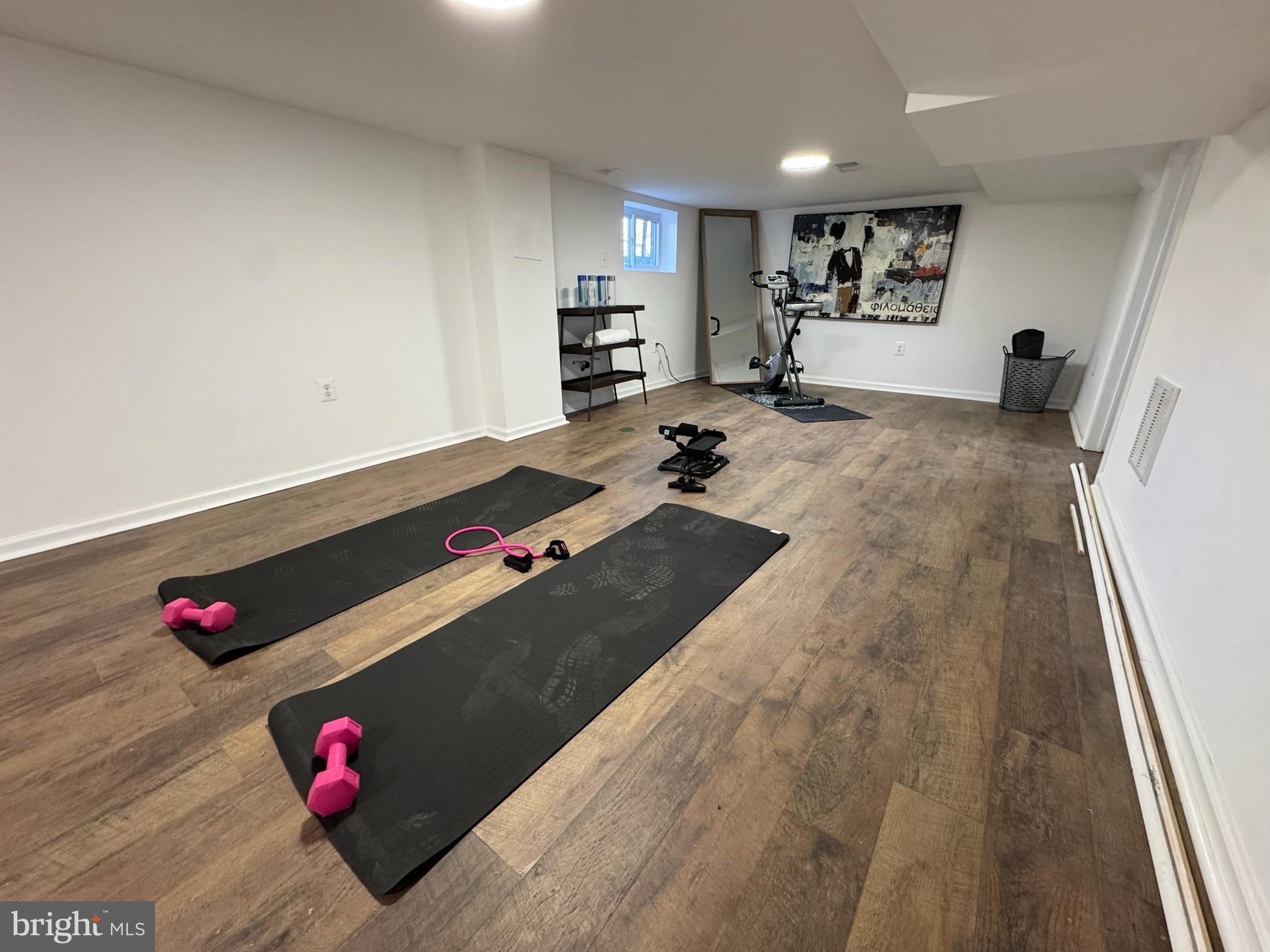 4116 32nd Street Mount Rainier, MD 20712 - Photo 39 of 51 a living room with kitchen view and a couch