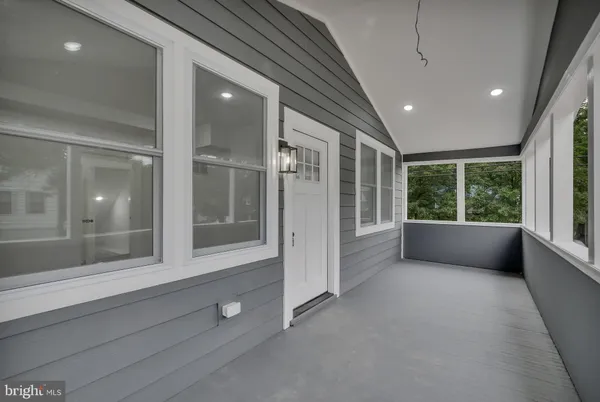 a view of livingroom with an empty space and window