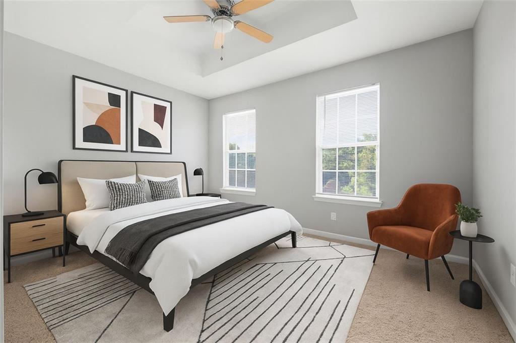 a bedroom with bed and a window