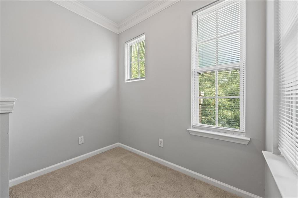 1752 Pryor Road Southwest, Unit 111 Atlanta, GA 30315 - Photo 11 of 20 an empty room with a window