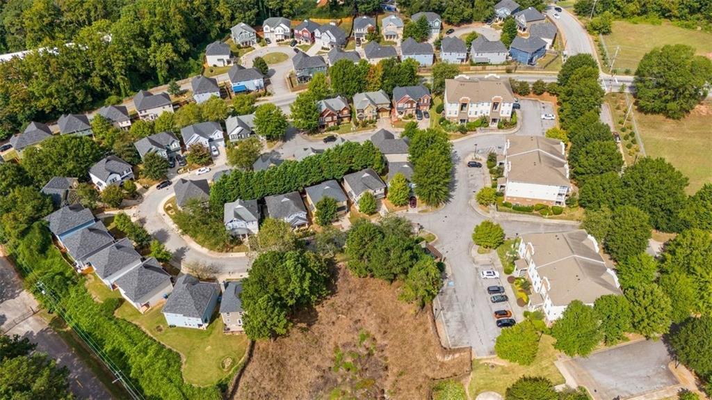 1752 Pryor Road Southwest, Unit 111 Atlanta, GA 30315 - Photo 20 of 20 an aerial view of residential houses with outdoor space