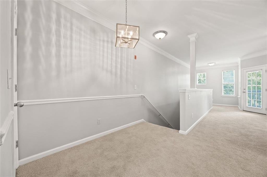 1752 Pryor Road Southwest, Unit 111 Atlanta, GA 30315 - Photo 7 of 20 a view of an empty room with a window