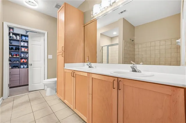 a bathroom with a bathtub and shower