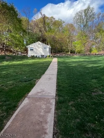 a view of a garden with an trees