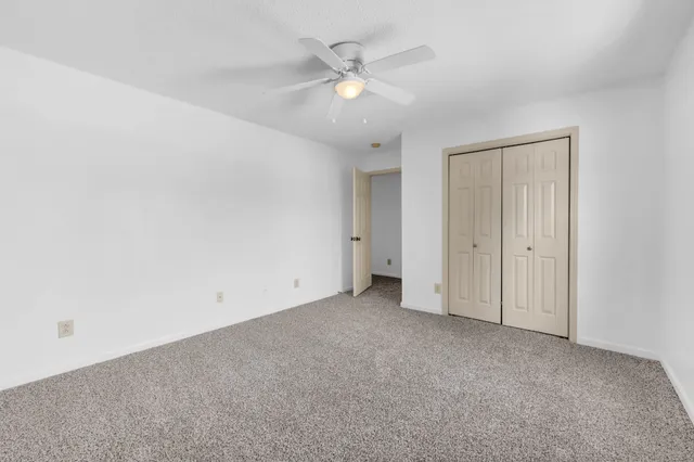 a bathroom with a sink a mirror and shower