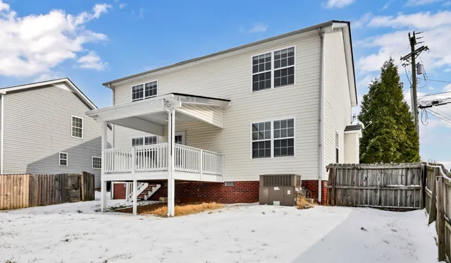 a view of a lounge chairs on the deck