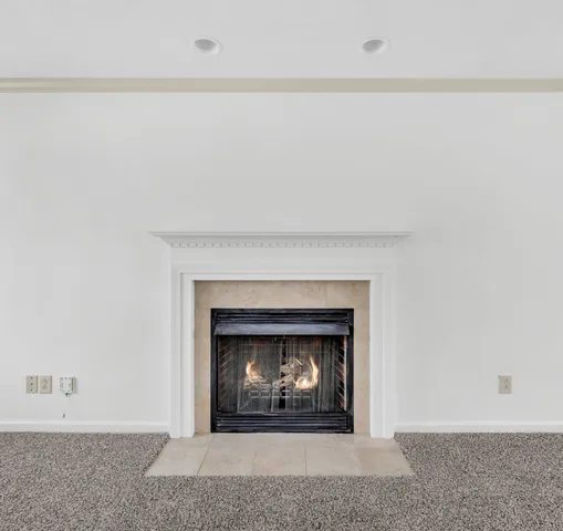 a living room with a fireplace