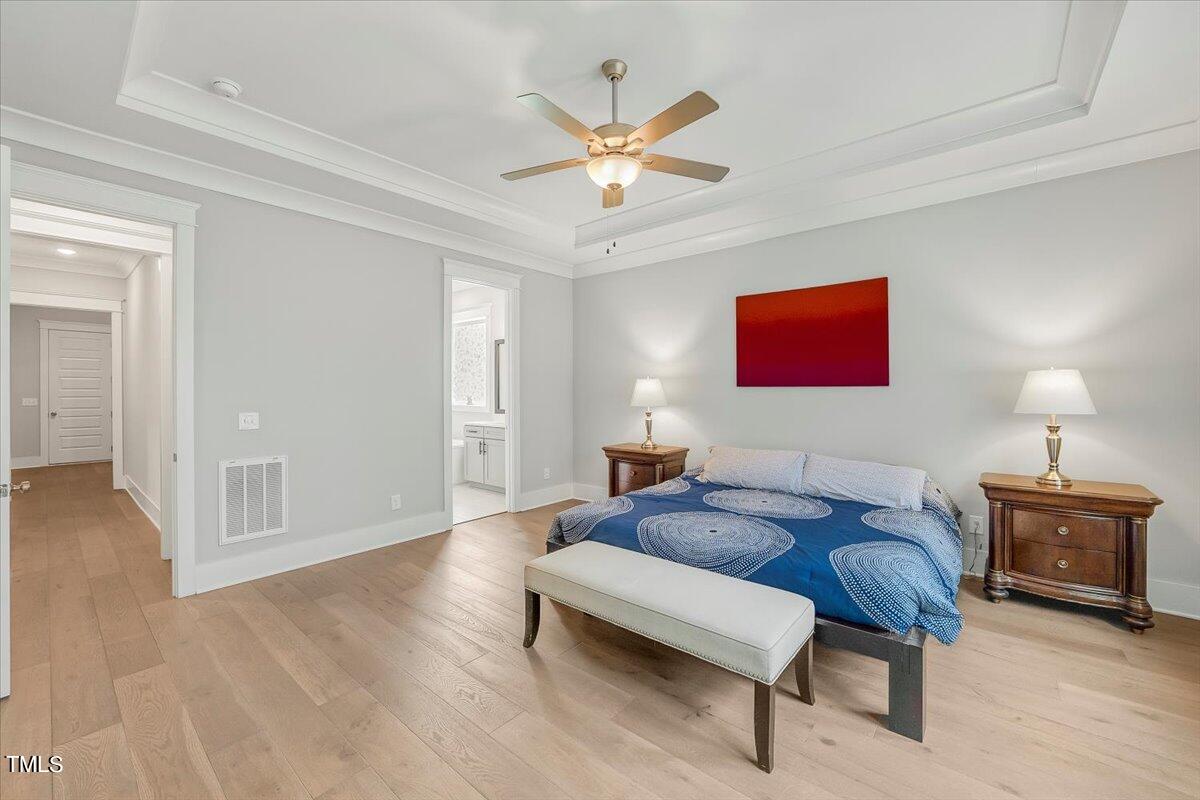 3812 Stoneridge Drive Raleigh, NC 27612 - Photo 17 of 46 a living room with furniture and a ceiling fan