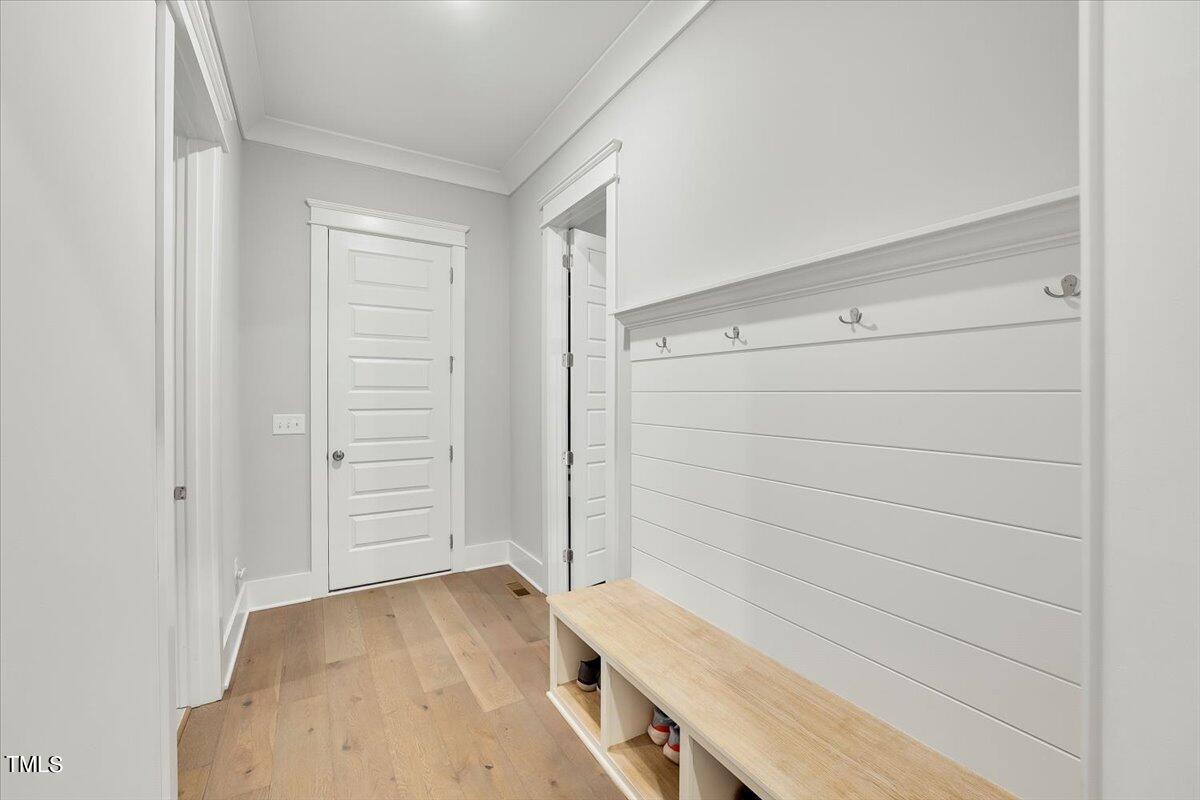 3812 Stoneridge Drive Raleigh, NC 27612 - Photo 23 of 46 wooden floor and cabinet in a room
