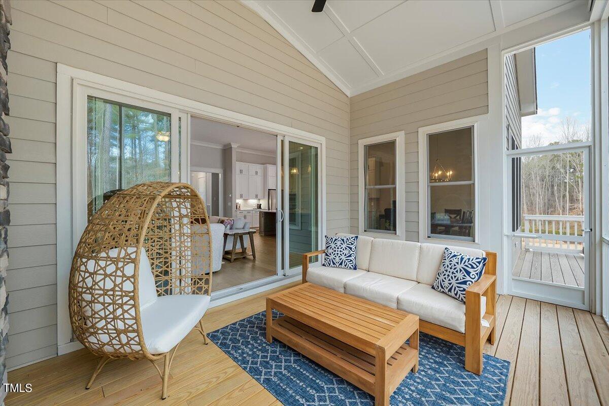 3812 Stoneridge Drive Raleigh, NC 27612 - Photo 25 of 46 a living room with furniture and a rug