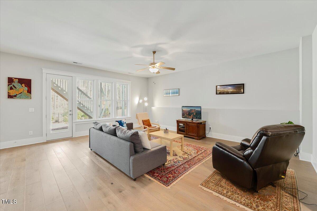 3812 Stoneridge Drive Raleigh, NC 27612 - Photo 36 of 46 a living room with furniture window and a couch