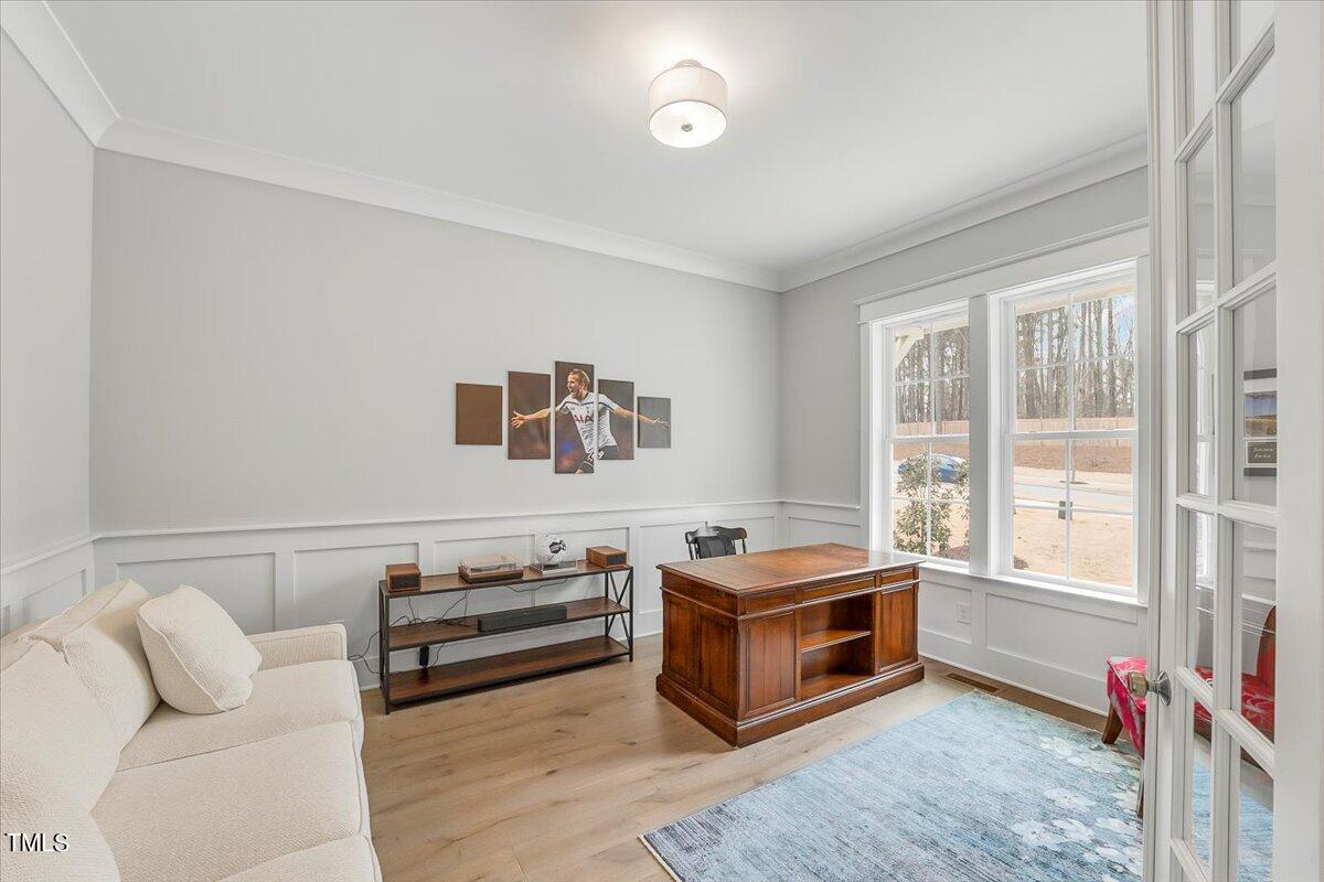3812 Stoneridge Drive Raleigh, NC 27612 - Photo 4 of 46 a living room with furniture and a window