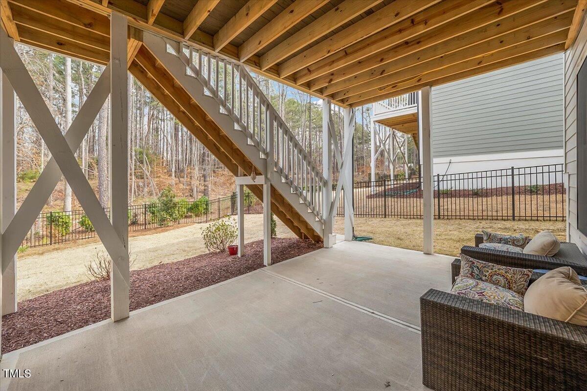 3812 Stoneridge Drive Raleigh, NC 27612 - Photo 44 of 46 a view of entryway and hall with wooden floor