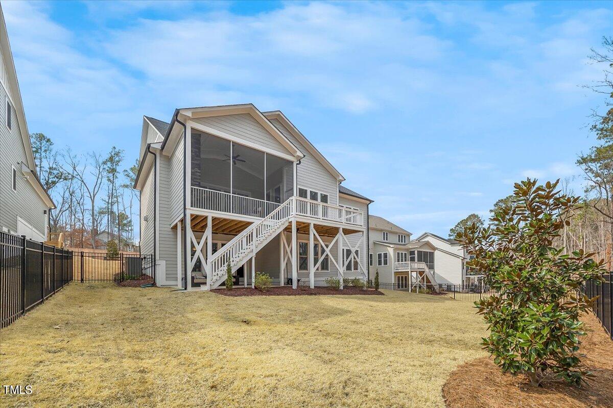 3812 Stoneridge Drive Raleigh, NC 27612 - Photo 46 of 46 a house with trees in the background