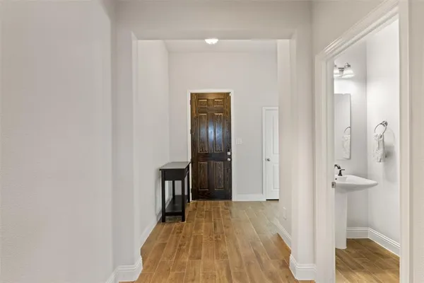 a view of a livingroom with wooden floor