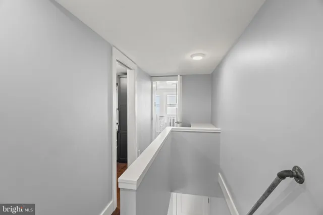 a view of a room with white walls