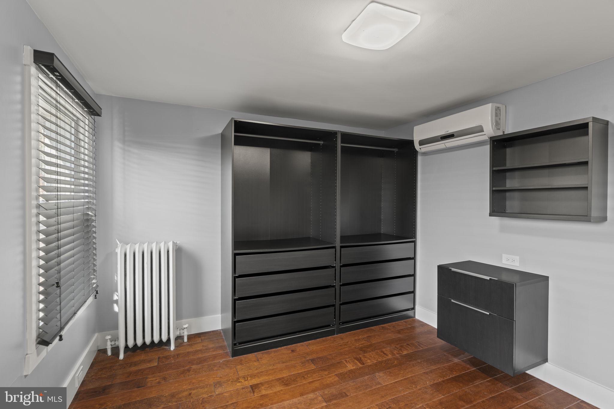 2173 East Hagert Street Philadelphia, PA 19125 - Photo 13 of 23 a view of walk in closet with empty racks