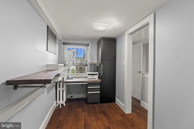 a kitchen with a sink and a stove top oven