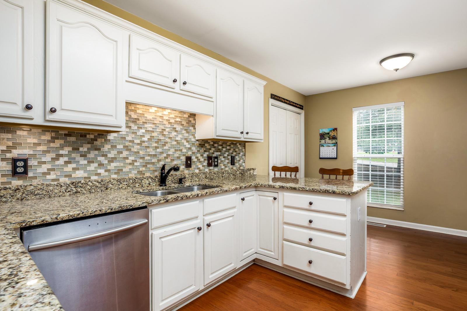 7507 Aubrey Ridge Place Fairview, TN 37062 - Photo 7 of 28 Beautiful backsplash is versatile and would complement any cabinet or paint color.