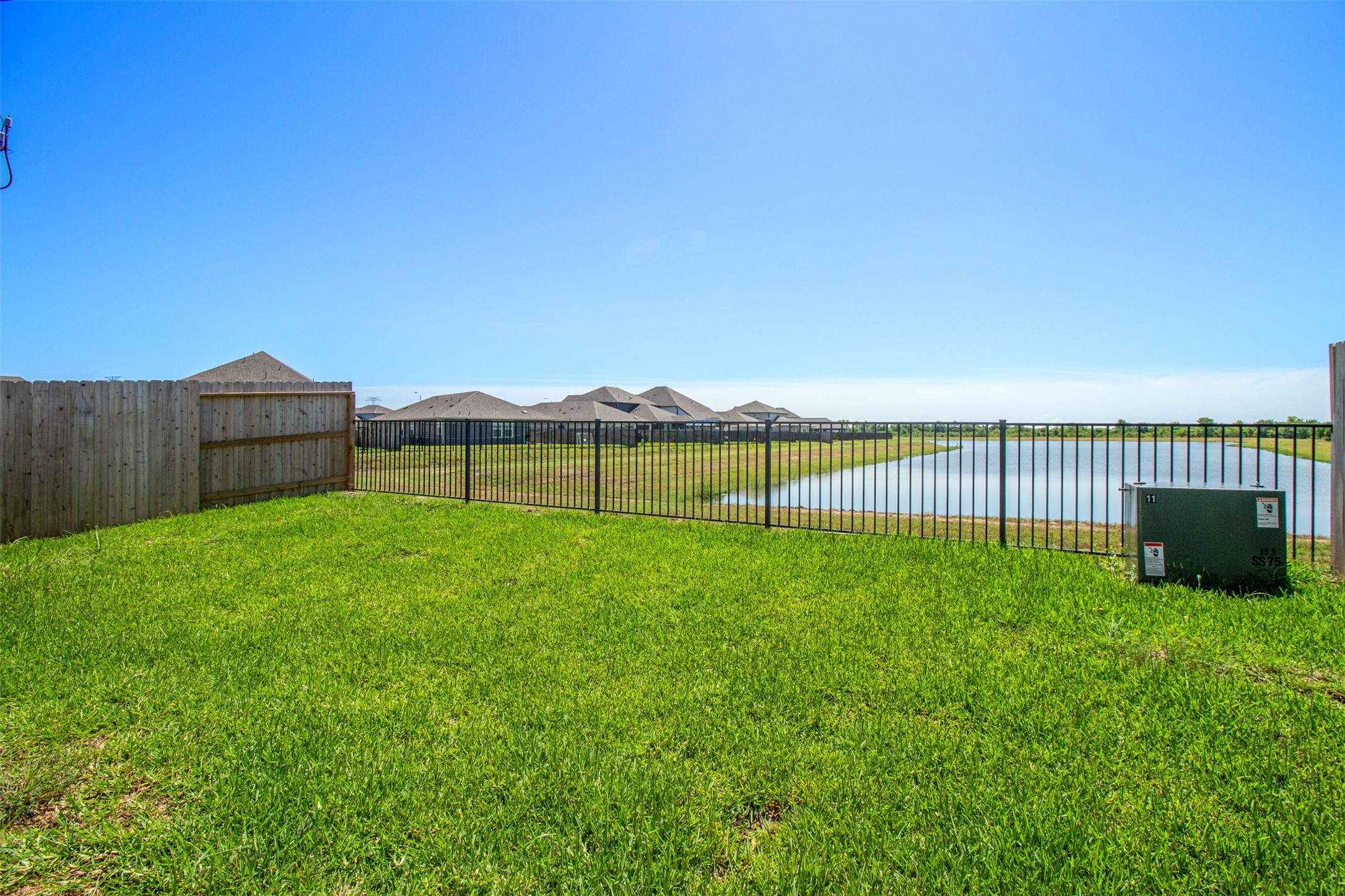 6643 Escondido Drive Rosharon, TX 77583 - Photo 24 of 25 a view of a backyard with a garden