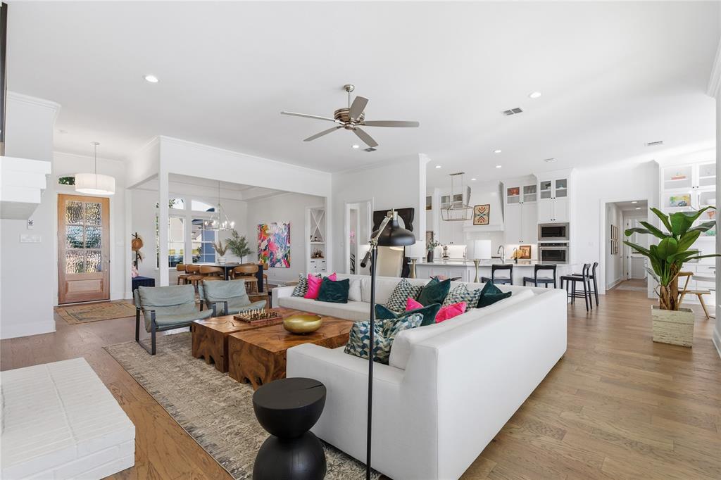 7754 Barber Rnch Road Fort Worth, TX 76126 - Photo 11 of 38 a living room with furniture and a chandelier