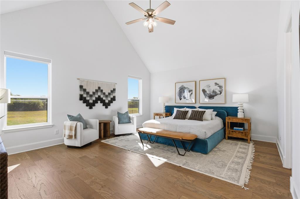 7754 Barber Rnch Road Fort Worth, TX 76126 - Photo 19 of 38 a living room with furniture and a chandelier