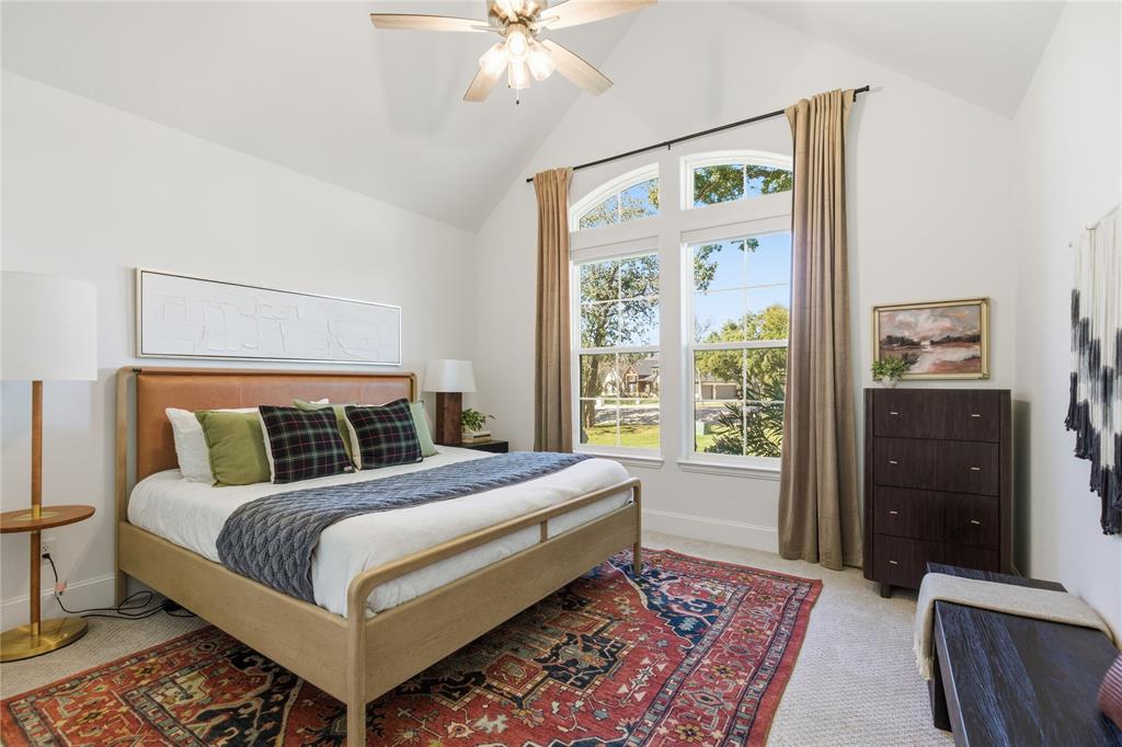 7754 Barber Rnch Road Fort Worth, TX 76126 - Photo 23 of 38 a bedroom with a large bed and a window