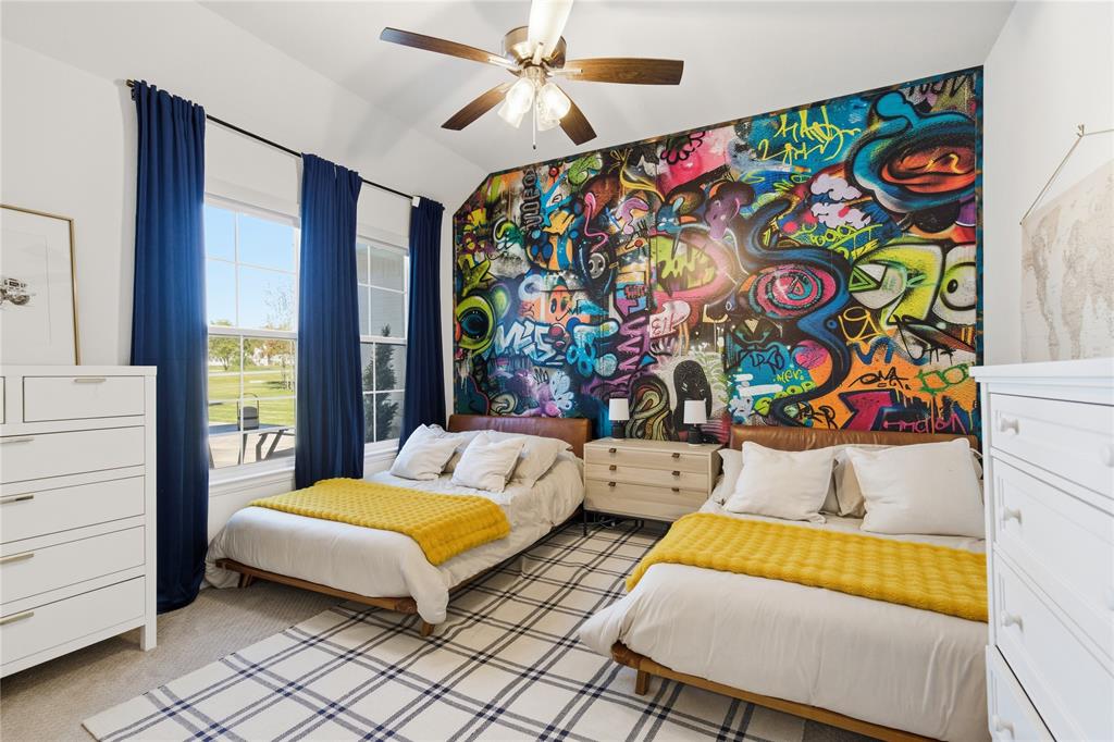 7754 Barber Rnch Road Fort Worth, TX 76126 - Photo 27 of 38 a bedroom with bed and a window