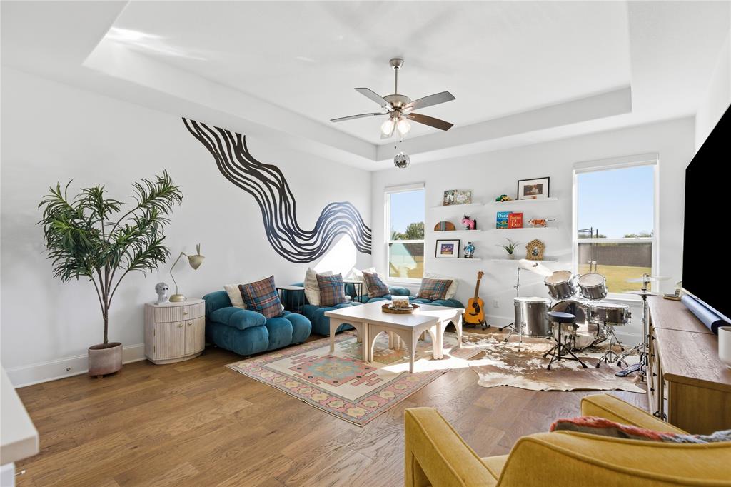7754 Barber Rnch Road Fort Worth, TX 76126 - Photo 30 of 38 a living room with furniture