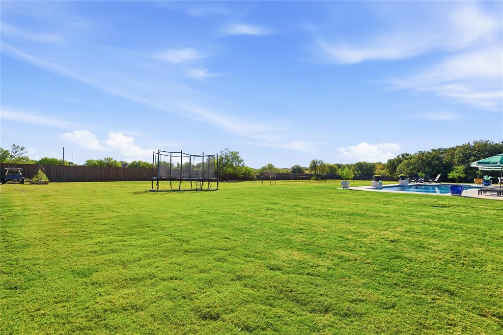 7754 Barber Rnch Road Fort Worth, TX 76126 - Photo 32 of 38 a view of an ocean from a yard