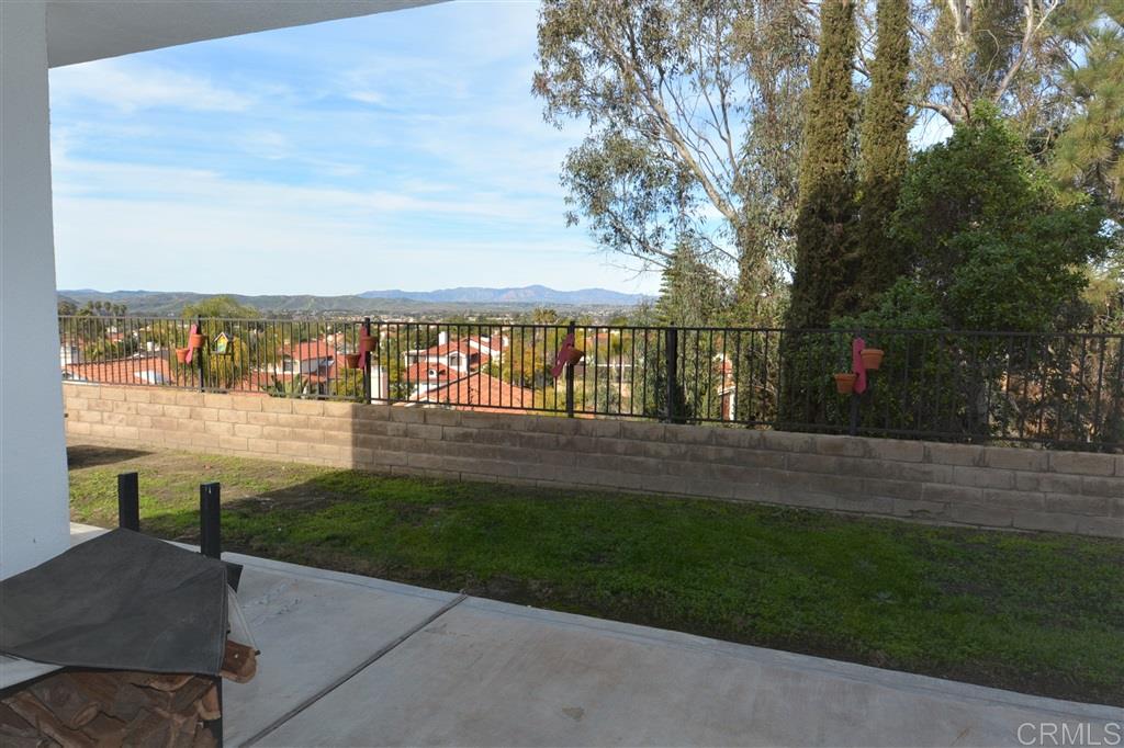 5050 Frazee Road Oceanside, CA 92057 - Photo 10 of 25 What a wonderful setting for entertaining. Private and serene, we are standing inside the French Doors.... looking over the covered outside cooking space, through a "Birder's" paradise to the Panoramic view beyond.