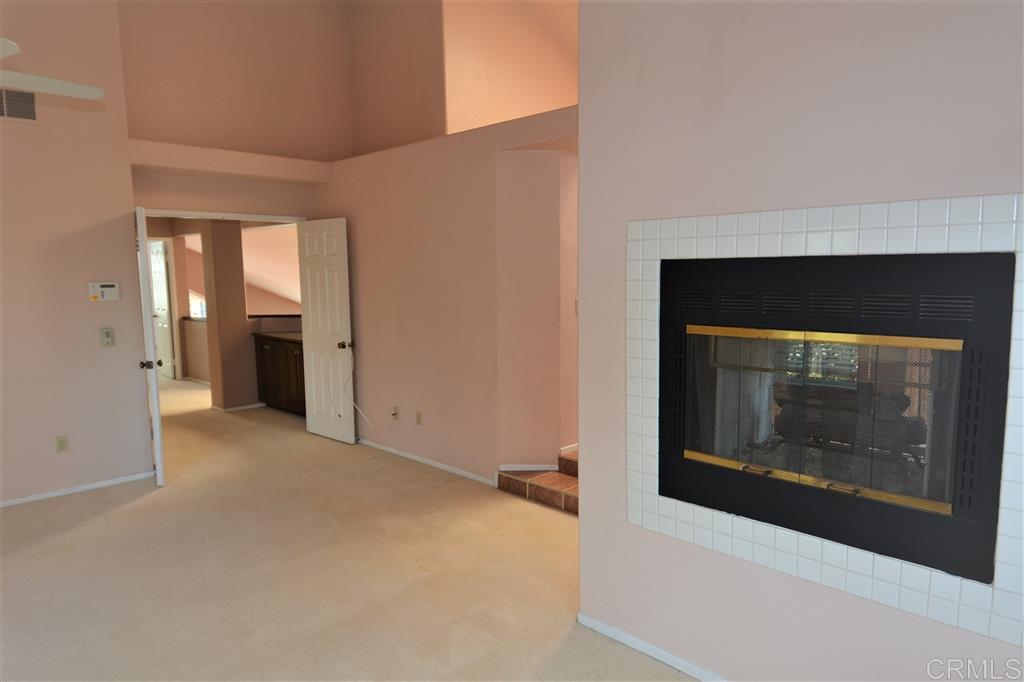 5050 Frazee Road Oceanside, CA 92057 - Photo 12 of 25 From the Lading entry... through wide double doors, we enter the Huge Master Suite with dramatic vaulted ceilings... Open overlooks, raised Master Bath and a romantic double sided "See Through" gas/wood fireplace.