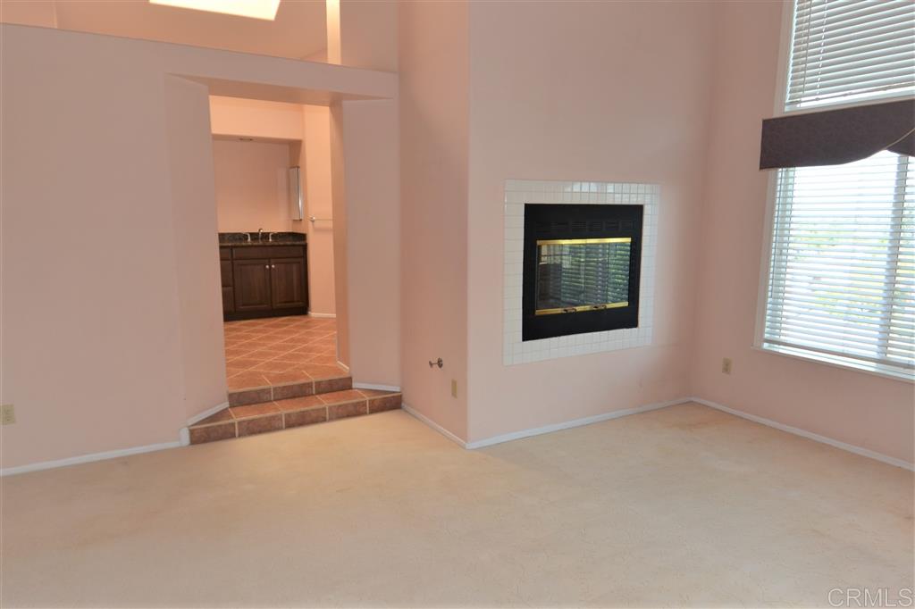 5050 Frazee Road Oceanside, CA 92057 - Photo 13 of 25 A Spacious elegant raised Master Bath, Romantic "See Through" fireplace and a truly Stunning Panoramic View master retreat area.