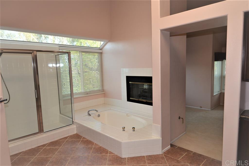 5050 Frazee Road Oceanside, CA 92057 - Photo 14 of 25 tep us into this Romantic Retreat Master Suite Bath. Fireside soaking tub with private garden view, "Party Sized" shower, dramatic overlooks and beautiful Tile. Of course there is a monster sized walk in closet.