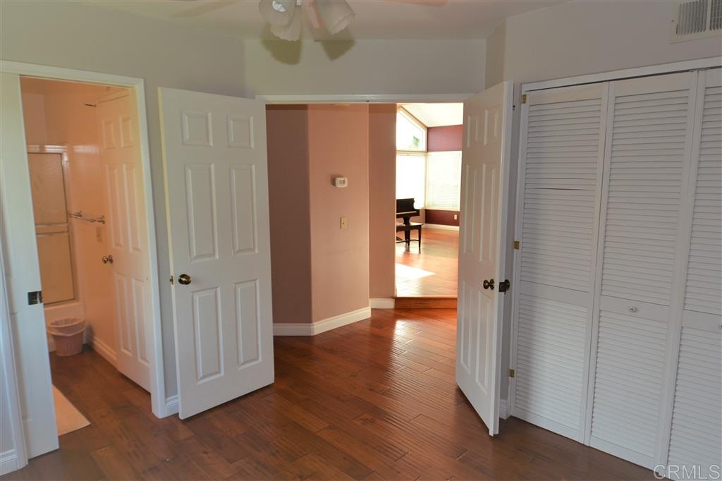5050 Frazee Road Oceanside, CA 92057 - Photo 20 of 25 Back downstairs we find the Office, or ground floor 4th bedroom with private access to an ensuite full bath. The full bath has a Jack and Jill entrance so guests do not have to enter the bedroom space.