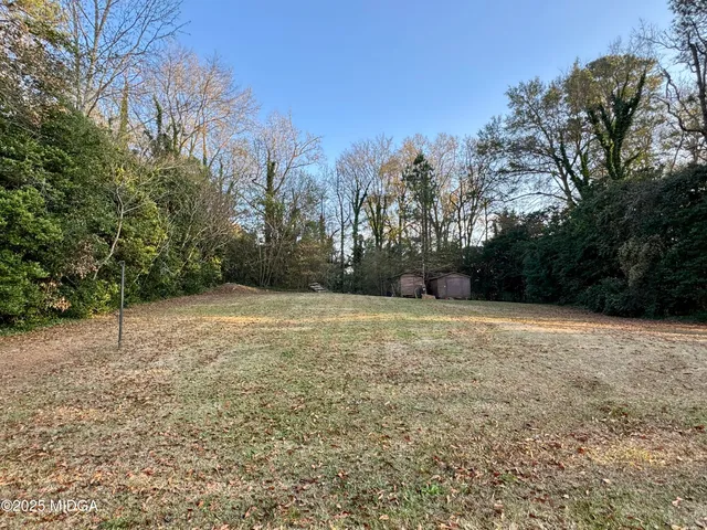 a view of a wooden fence
