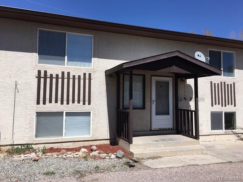 2153 Preuss Road Colorado Springs, CO 80910 - Photo 1 of 17 a front view of a house