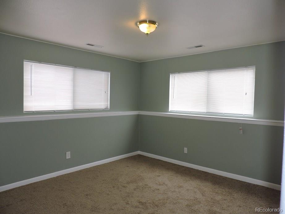 2153 Preuss Road Colorado Springs, CO 80910 - Photo 14 of 17 an empty room with a window