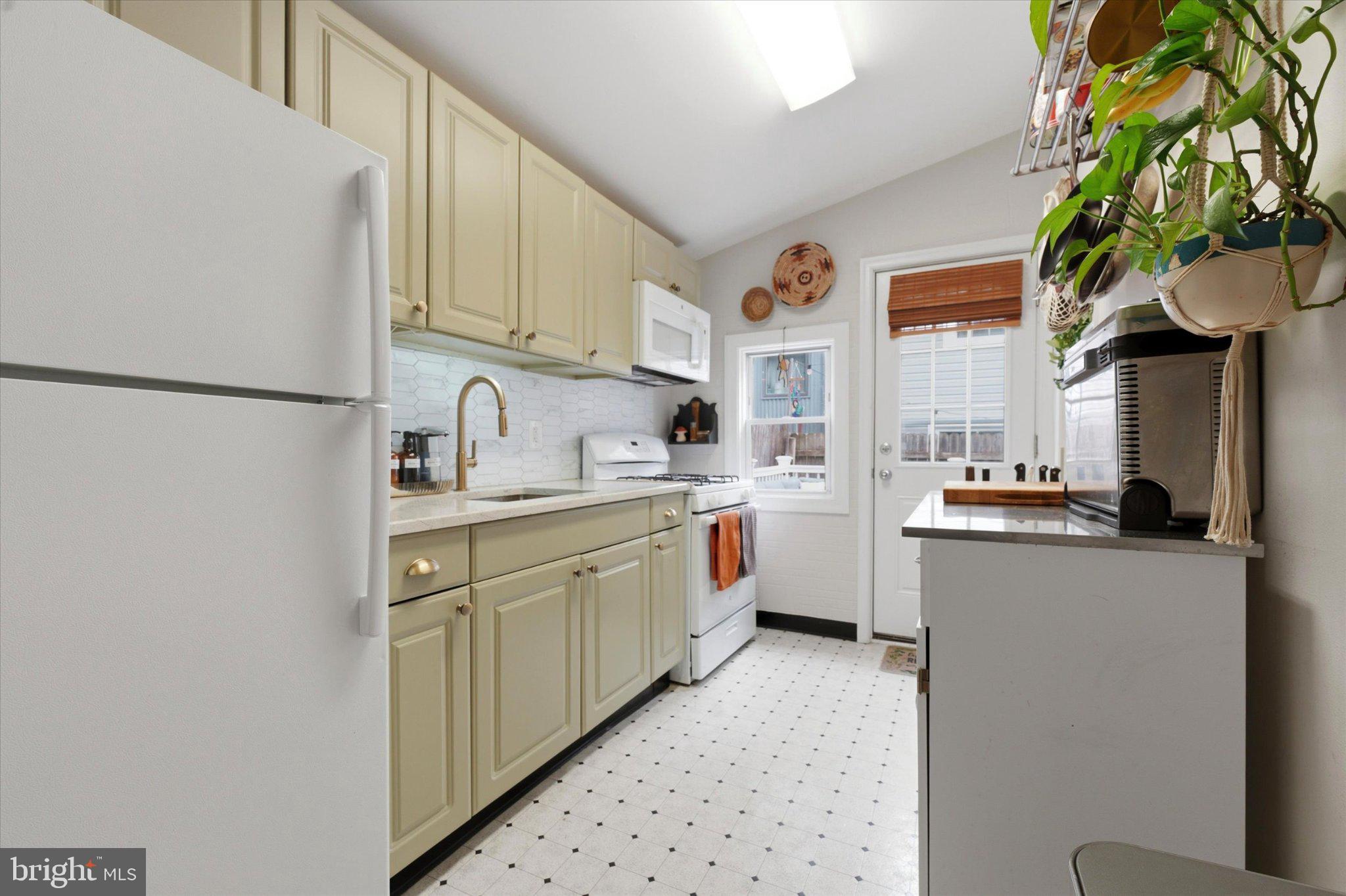 1233 East Colona Street Philadelphia, PA 19125 - Photo 12 of 25 Charming kitchen with modern touches.