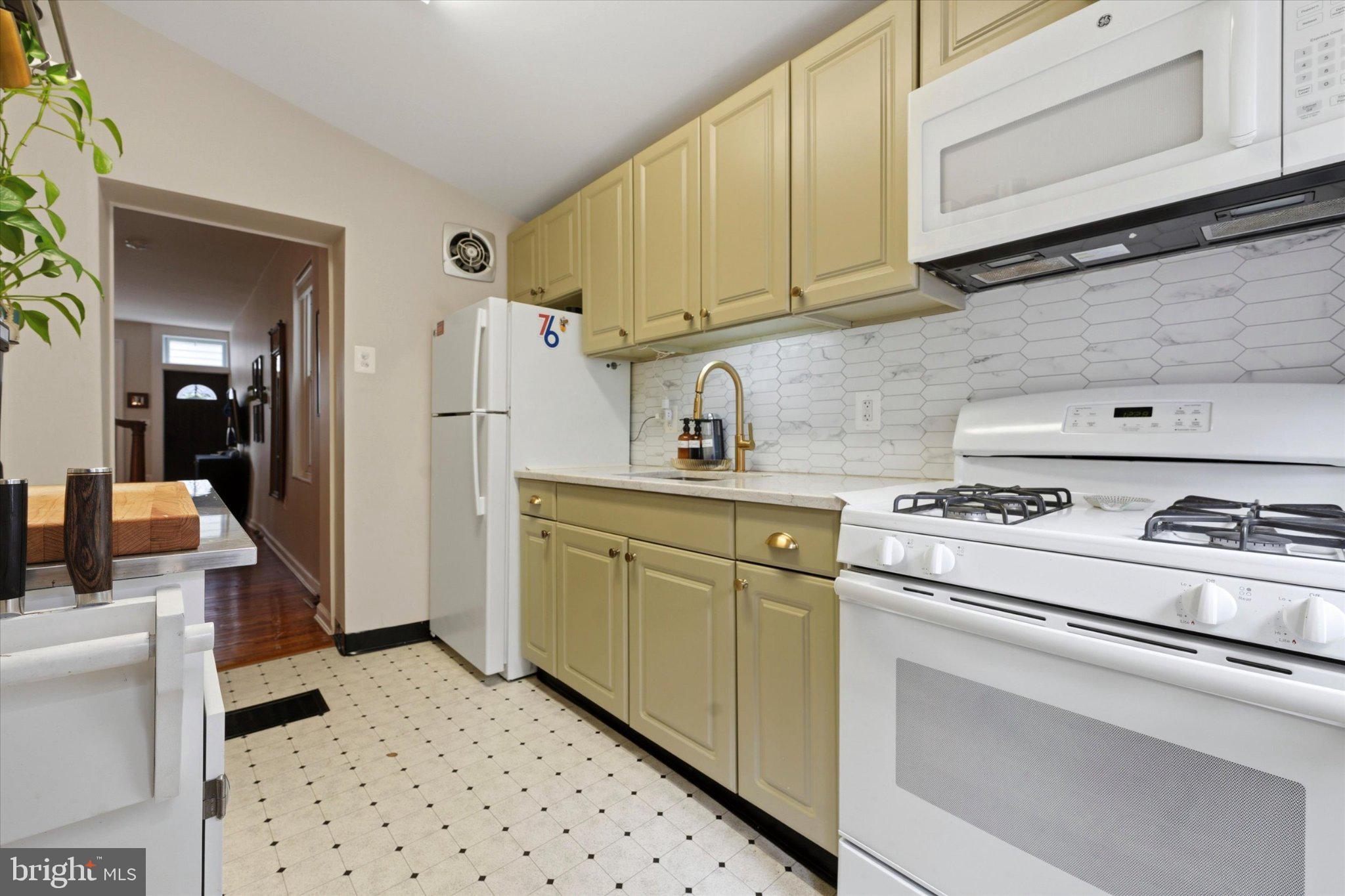 1233 East Colona Street Philadelphia, PA 19125 - Photo 14 of 25 Charming kitchen with modern touches.