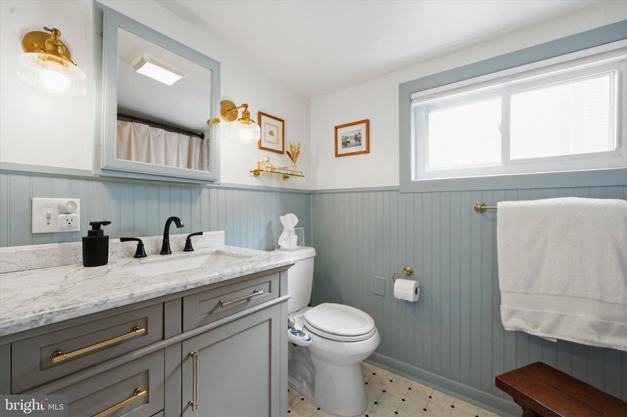 1233 East Colona Street Philadelphia, PA 19125 - Photo 23 of 25 Charming coastal-inspired bathroom retreat.
