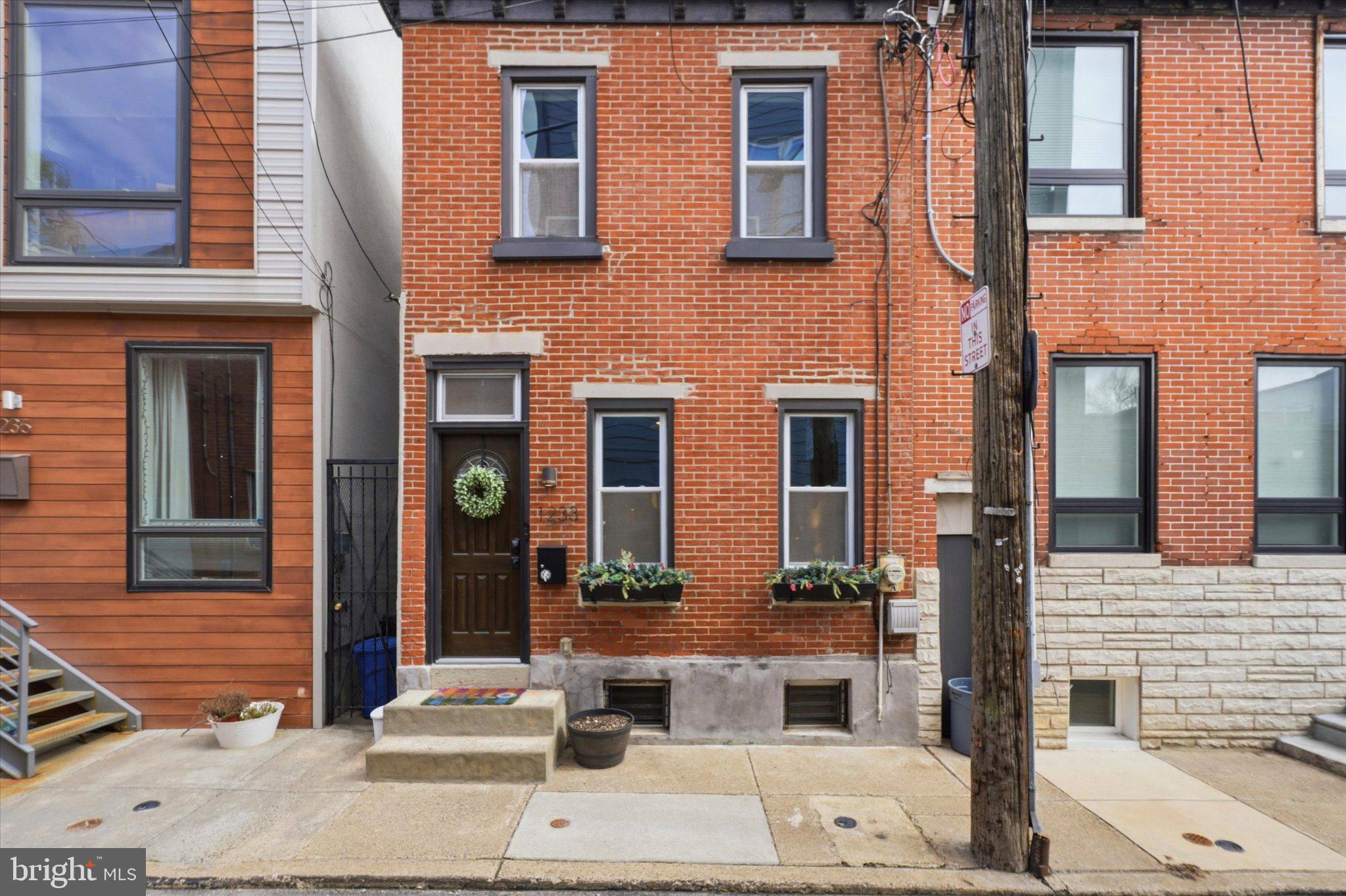 1233 East Colona Street Philadelphia, PA 19125 - Photo 25 of 25 Charming brick facade in urban setting.