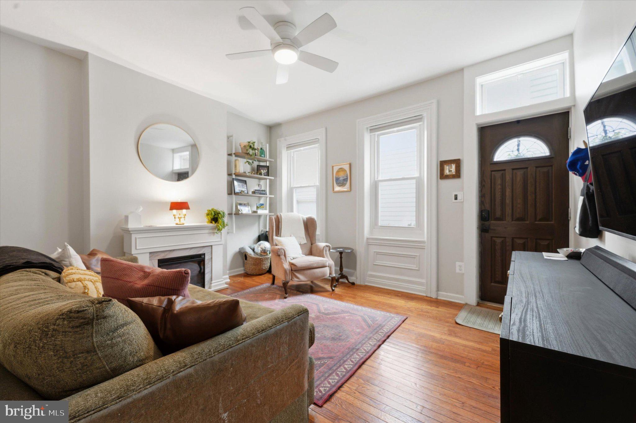 1233 East Colona Street Philadelphia, PA 19125 - Photo 3 of 25 Cozy living space with natural light.