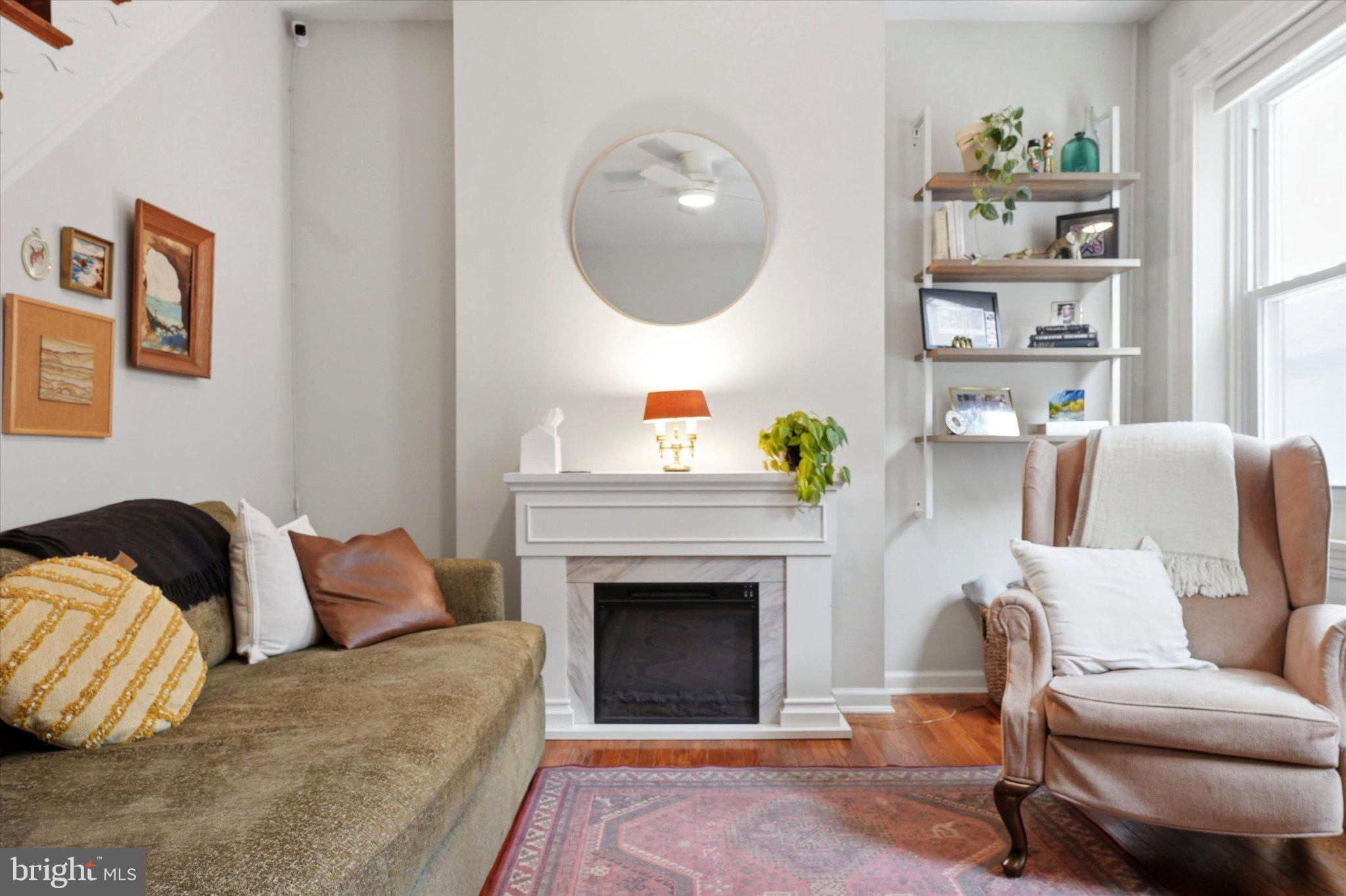 1233 East Colona Street Philadelphia, PA 19125 - Photo 5 of 25 Charming living space with cozy vibes.