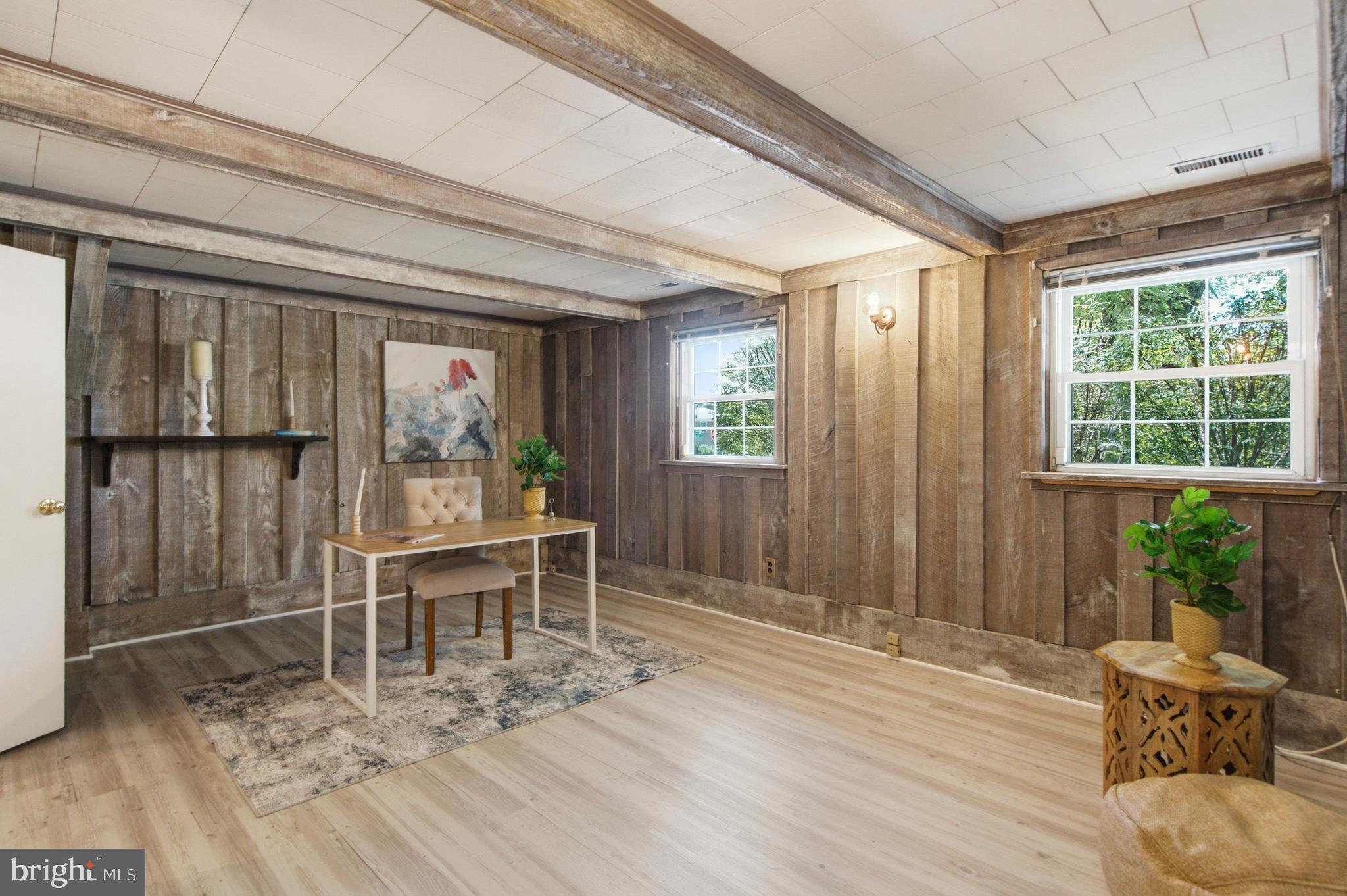220 Solway Road Lutherville-Timonium, MD 21093 - Photo 22 of 38 a dining room with wooden floor and a window