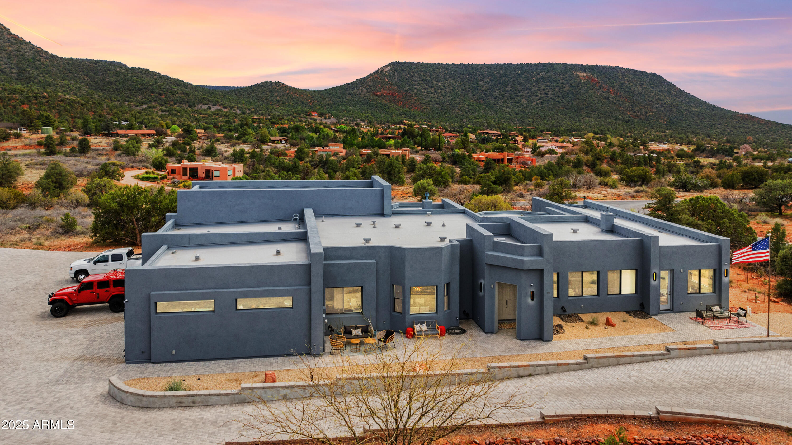 a view of multiple houses with a street