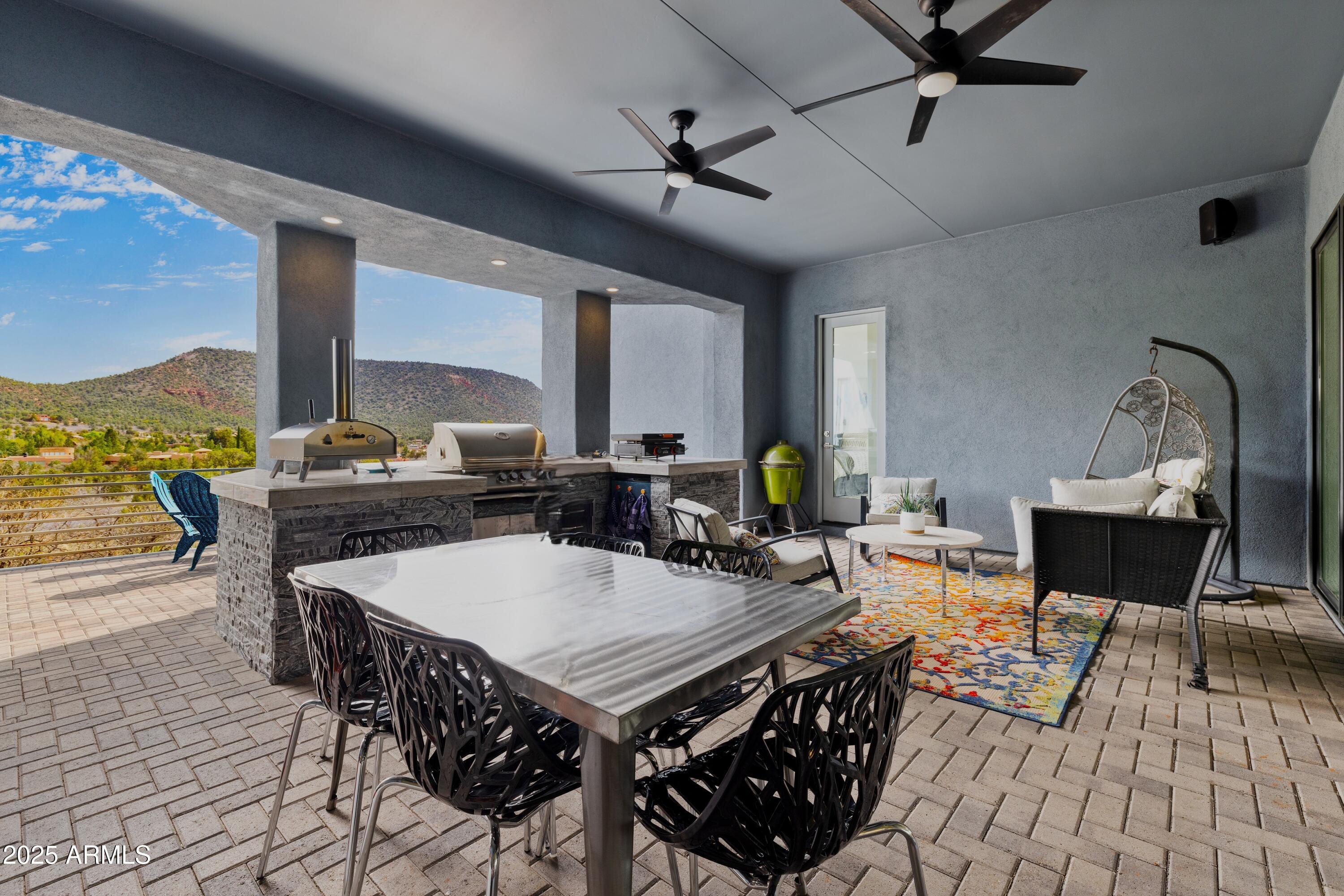 10 Ho Hum Circle Sedona, AZ 86351 - Photo 10 of 48 a view of a dining room with furniture window and outside view